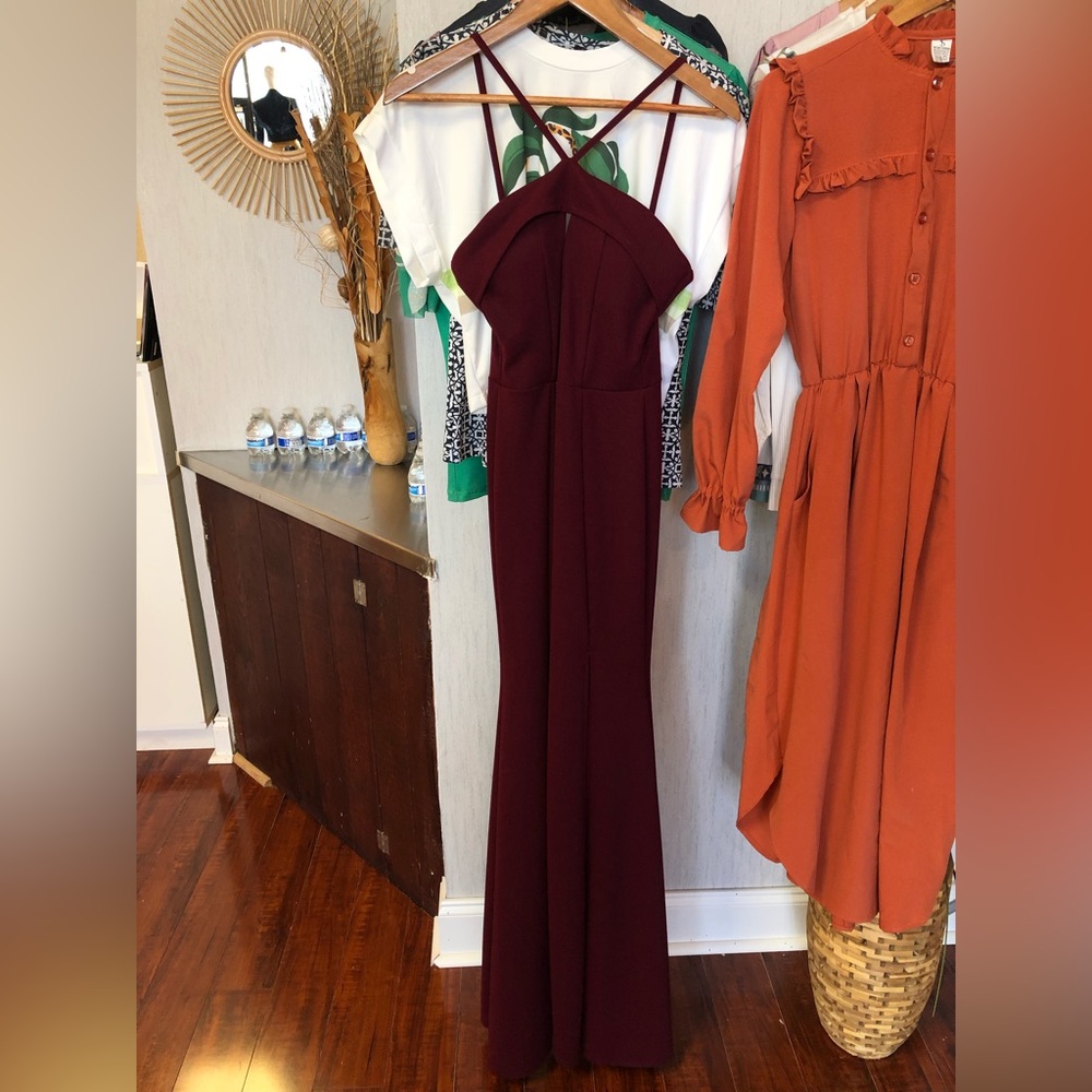 Burgundy dress with split leg.